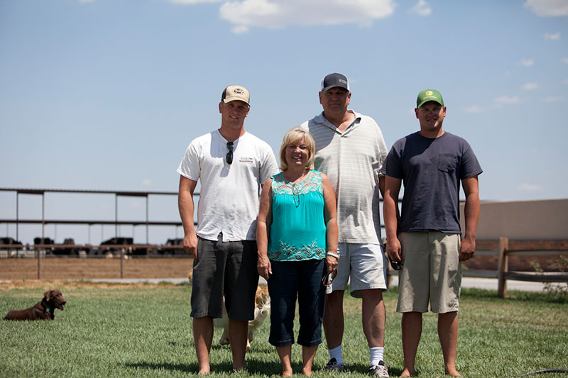 The Alger family in front of their dry lot dairy. 