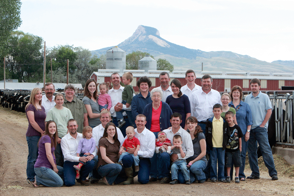 The entire George family poses for a photograph on their dairy in Wyoming.