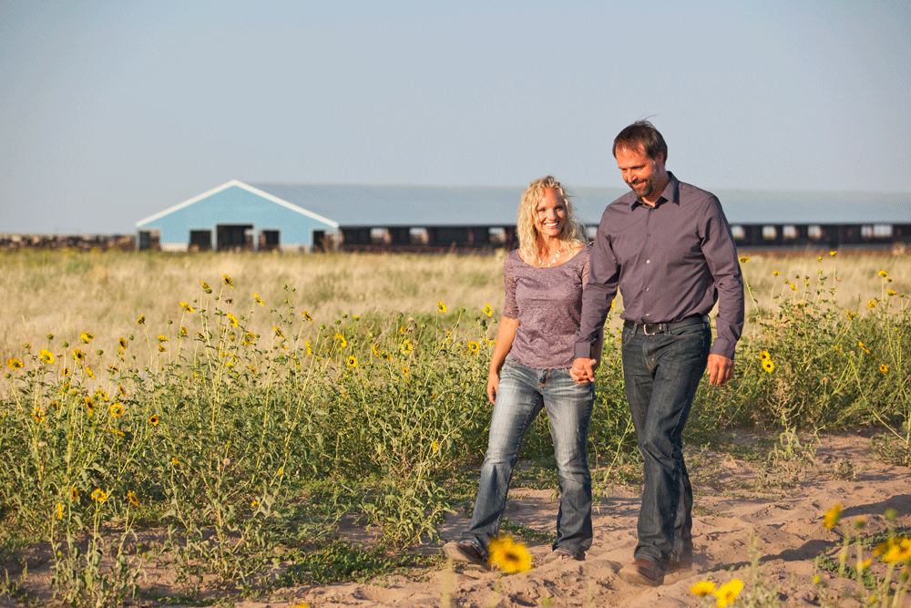 Dennis and Jennifer Koolstra take a walk near their dairy farm.