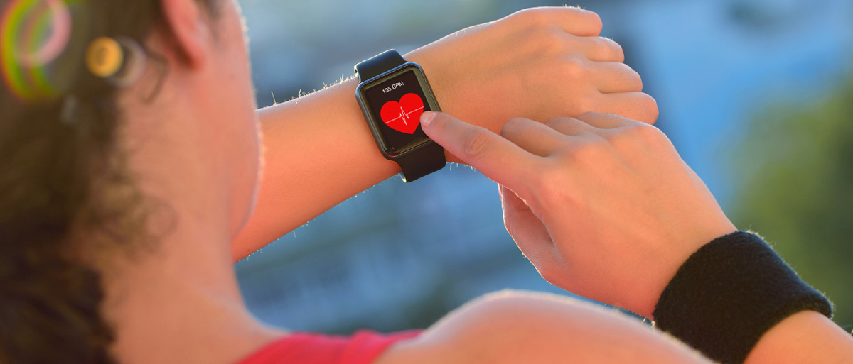 person looking at a smart watch