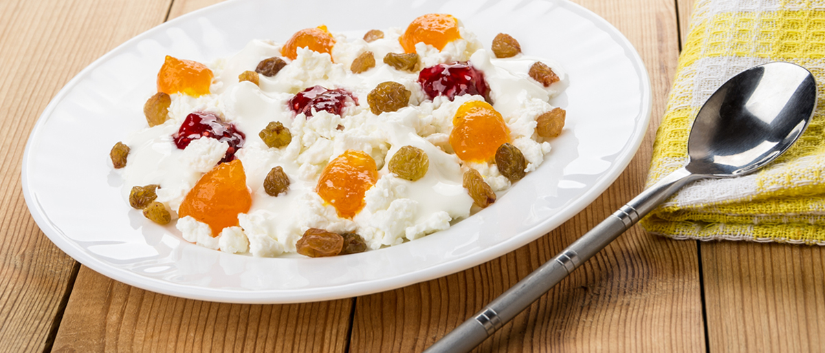 bowl of cottage cheese topped with fruit