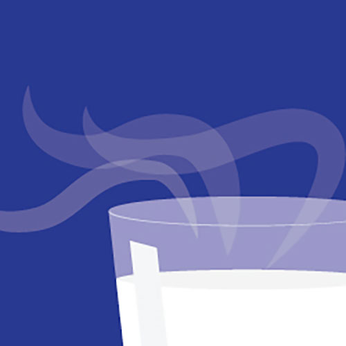 blue background with a cup of white milk that has steam coming off the top
