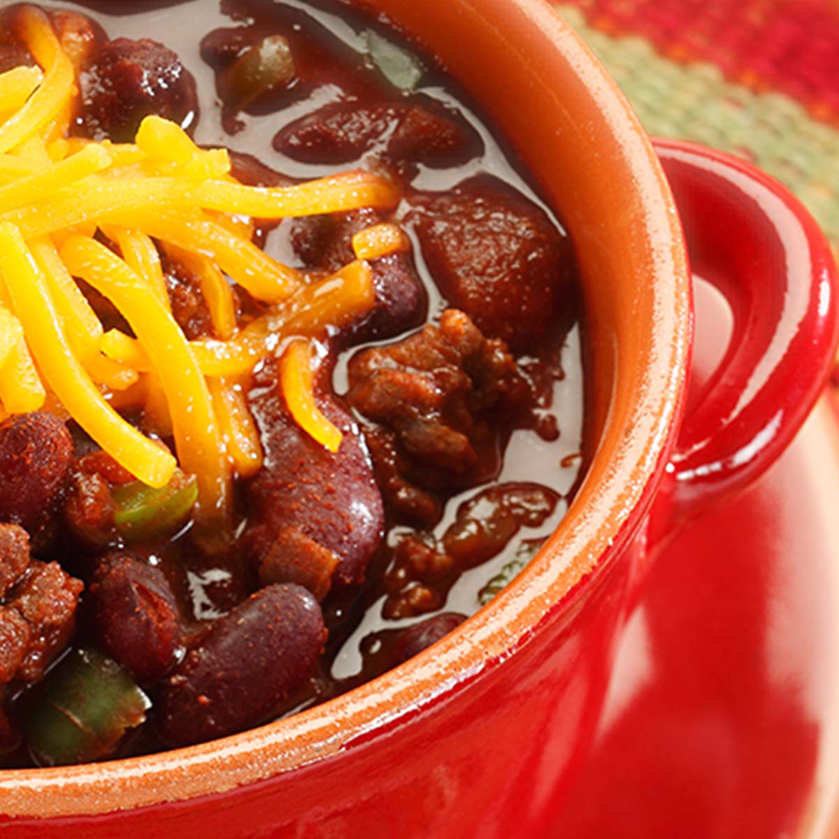 bowl of chili with cheese on top