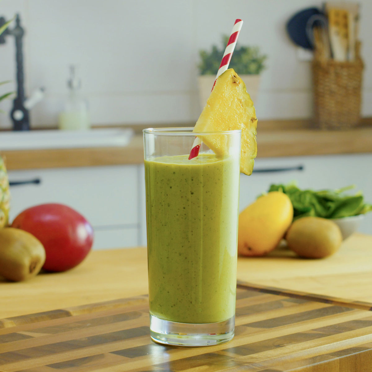 go green smoothie garnished with pineapple
