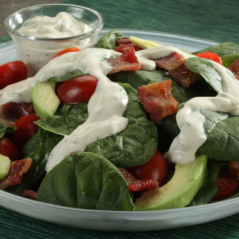 greek yogurt dressing on a salad