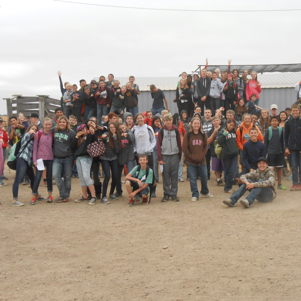group photo of students on dairy farm