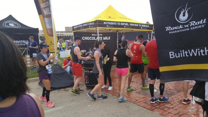 Marathoners stopping by the chocolate milk tent to recover.